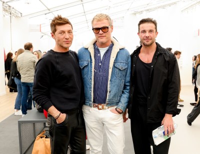 Evangelo Bousis, Peter Dundas and Frederico Castro Debernardi at Frieze LA at the Santa Monica Airport on February 29, 2024 in Los Angeles, California.