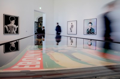 24 April 2019, Berlin: Photographs by Moneta Sleet Jr. (M) and Isaac Sutton (l and r) can be seen in the exhibition "The Black Image Corporation" in the Martin-Gropius-Bau behind a showcase with editions of the magazine "Ebony". The exhibition, designed by Theaster Gates, focuses on the work of the two photographers Moneta Sleet Jr. and Isaac Sutton. (Wiping effect due to long exposure time) Photo: Christoph Soeder/dpa (Photo by Christoph Soeder/picture alliance via Getty Images)