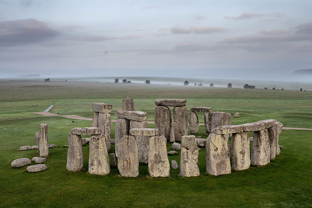 The ancient neolithic monument of Stonehenge near Amesbury is viewed from a hot air balloon on September 7, 2016 in Wiltshire, England. To mark the 30th anniversary of Stonehenge becoming a World Heritage Site, English Heritage has launched a competition offering members of the public the chance of a hot balloon ride which allows the chance to see a unique view of Stonehenge within in a wider prehistoric landscape but also the see the recent changes to its setting in recent years including the removal of the A344 and the old car park. (Photo by Matt Cardy/Getty Images)